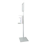 Weiße, moderne hygoclean desinfektionssäule aus aluminium mit armhebelspender auf hohem ständer und schildhalter
