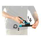 Teal und schwarzer handlicher eiskratzer mit ergonomischem griff moerman excelerator fensterwischer griff 2.0