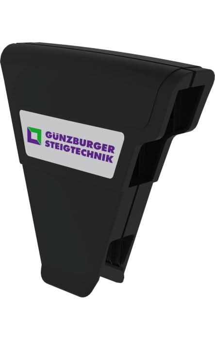 Schwarzer kunststoffclip mit weißem etikett und günzburger steigtechnik logo im produkt munk ergo-pad griffzone